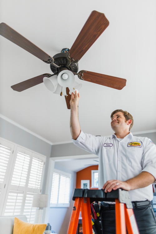 Service Minds Mr. Sparky electrician completing a Ceiling Fan Installation in Gainesville, FL.